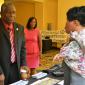 USVI  Lt. Governor Gregory R. Francis and his wife Second Lady Cheryl Francis visit with VIEDA staff at their display table.